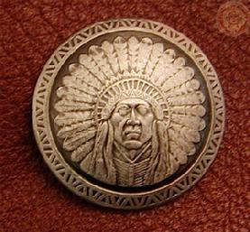 Indian head Concho, screw back, these "ARE" our best sellers!  They are absolutely fantastic!  In over 15 years of using them I've only had "one" to tarnish!  I don't know what it's made of but, it's really high quality.  $10.00 each, (BUY 5 GET 1 FREE)